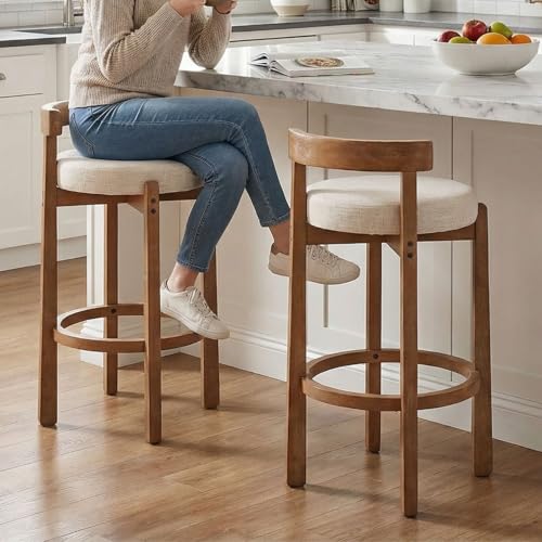Image of LukeAlon Mid Century Linen Bar Stools Set of 2, 30.25 inch Seat Height Upholstered Barstools with Wood Legs Modern Tall Bar Chair with Curved Low Back Round Footrest for Pub Home Kitchen Island, Beige
