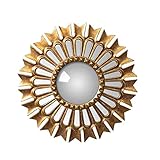 Ce miroir est rythmé par ses bordures finement travaillée de couleur doré qui prends la forme d'un beau soleil.