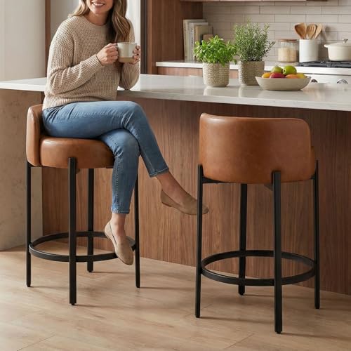 Image of LukeAlon Modern PU Leather Counter Height Stools Set of 2, Upholstered 26 inch Seat Height Barstools with Black Metal Legs Round Low Back Kitchen Stools with Footrest for Dining Room Small Places, Brown