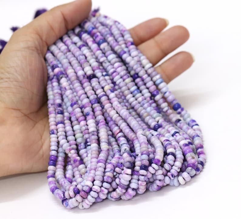 Perles lisses naturelles d'exception, un éclat violet unique pour des créations haut de gamme