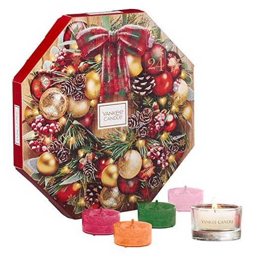 Yankee Candle Adventskalender presentset, med 24 doftande värmeljus och 1 värmeljushållare av glas i en festlig kransformad presentförpackning
