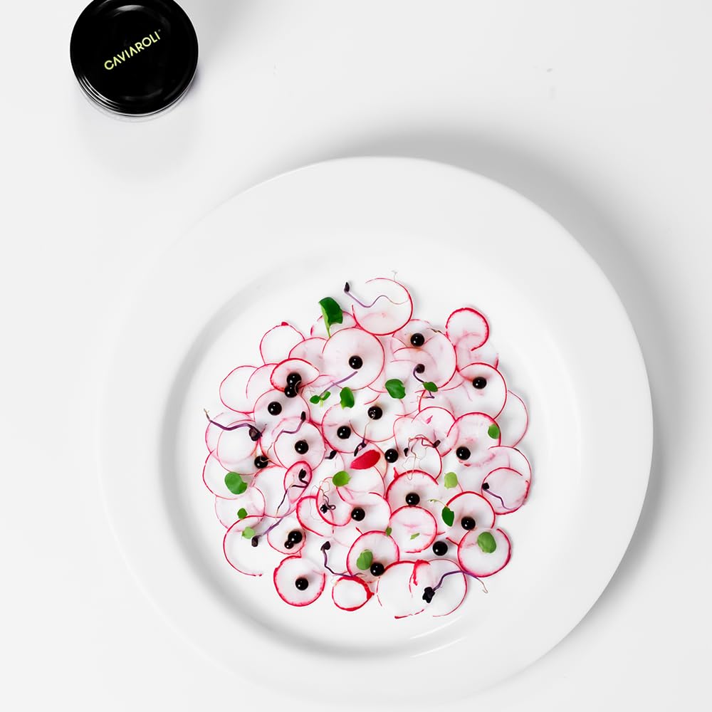 Perles de Vinaigre de Modène Gourmet pour Vinaigrette ou Décoration pot 200gs. Les sphères de vinaigre de Modène dans son intérieur liquide explosent dans la bouche lorsqu'elles sont mordues.