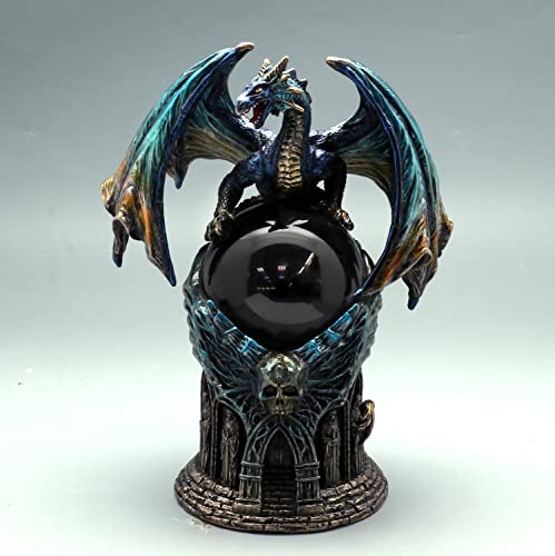 Estatua decorativa de dragón con esfera de cristal