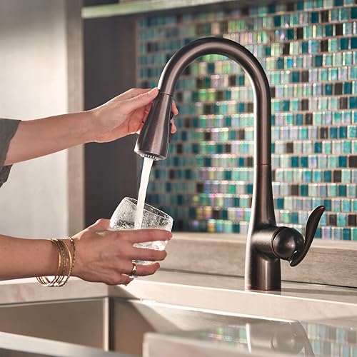Image of Moen Arbor Oil Rubbed Bronze Motionsense Wave Touchless One-Handle Pulldown Kitchen Faucet Featuring Power Clean, 7594EWORB