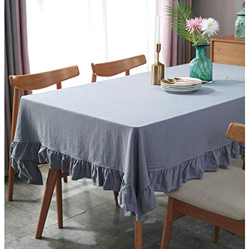 Nappe à pompons grand format pour protéger et habiller la table
