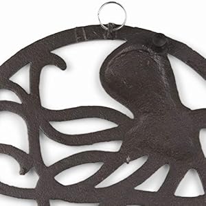 GASARÉ, Cast Iron Trivet for Hot Dishes, Pots, and Pans, Metal Trivet, Octopus Design, Rubber Feet Caps, Ring Hanger, 8 Inches, Brown, 1 Unit GASARE Cast Iron Trivet for Hot Dishes Pots and Pans Metal Trivet Octopus Design Rubber Feet Caps Ring Hanger 8 Inches Brown 1 Unit