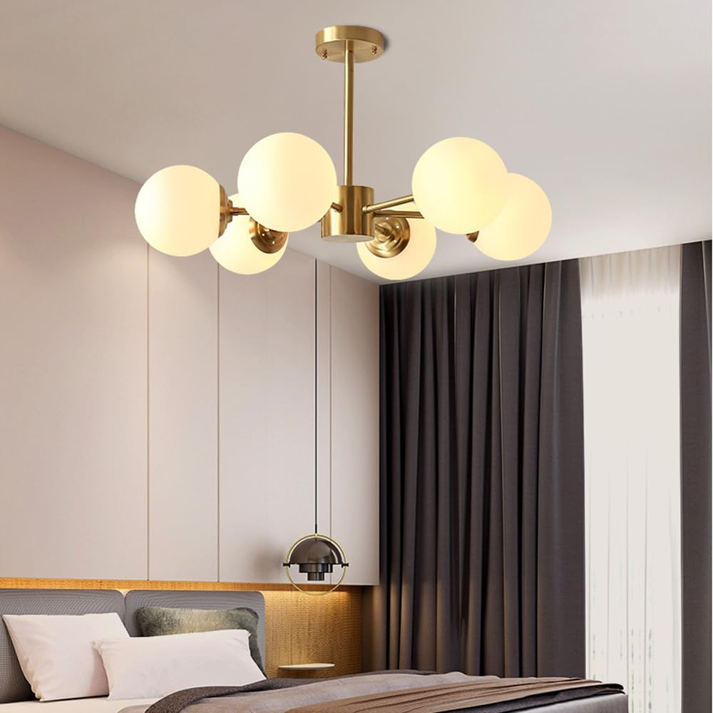 Lustre moderne en or et verre pour illuminer votre salle à manger
