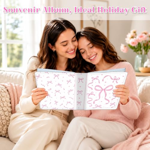 Image of Photo Album 4x6 120 Pockets Pink Ribbon Bow Pattern | 120 clear 4x6 photo pockets, strong elastic band, compact album, family travel wedding use, pink ribbon bow cover
