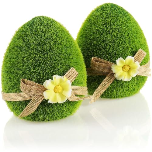com-four® 2X Dekofigur - Osterei mit Schleife und Blumen - grüne Deko-Figuren für Frühling und Ostern - Keramik-Eier mit Kunst-Gras überzogen - Osterdeko (2X Ei - 11cm)