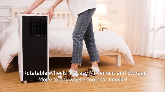 A person washing the air filter under running water in a sink.