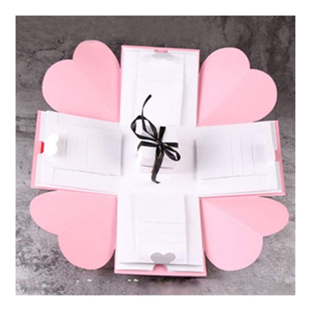 Scrapbook bricolage et album photo dans une boîte explosion rose pour anniversaire
