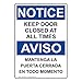 ComplianceSigns.com NOTICE Keep Door Closed At All Times Bilingual OSHA Safety Sign, 10x7 inch Plastic for Enter/Exit