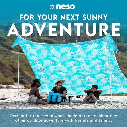 Image of Neso Gigante Portable Beach Tent Sun Shelter - Lightweight Beach Shade Canopy - Easy Setup for Family Outings - Patented Reinforced Corners - UPF 50+ - 8ft Tall, 11 x 11ft - Aqua Fronds
