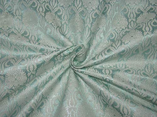Tissu brocart de soie pastel l'éclat poétique du vert d'eau et de l'ivoire métallisé