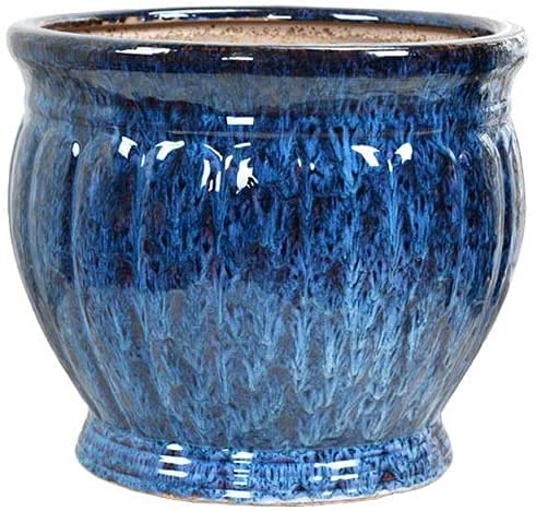 Vase coloré artisanal en céramique bleue pour sublimer vos plus belles plantes.