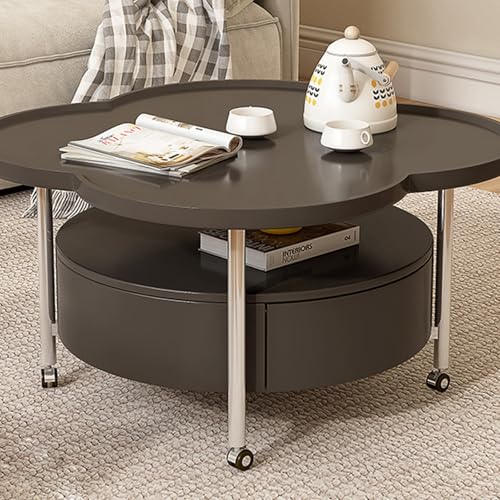 Table basse noire sur roulettes idéale pour aménager un salon cosy