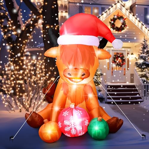 Aufblasbare Hochlandkuh mit Weihnachtsmütze