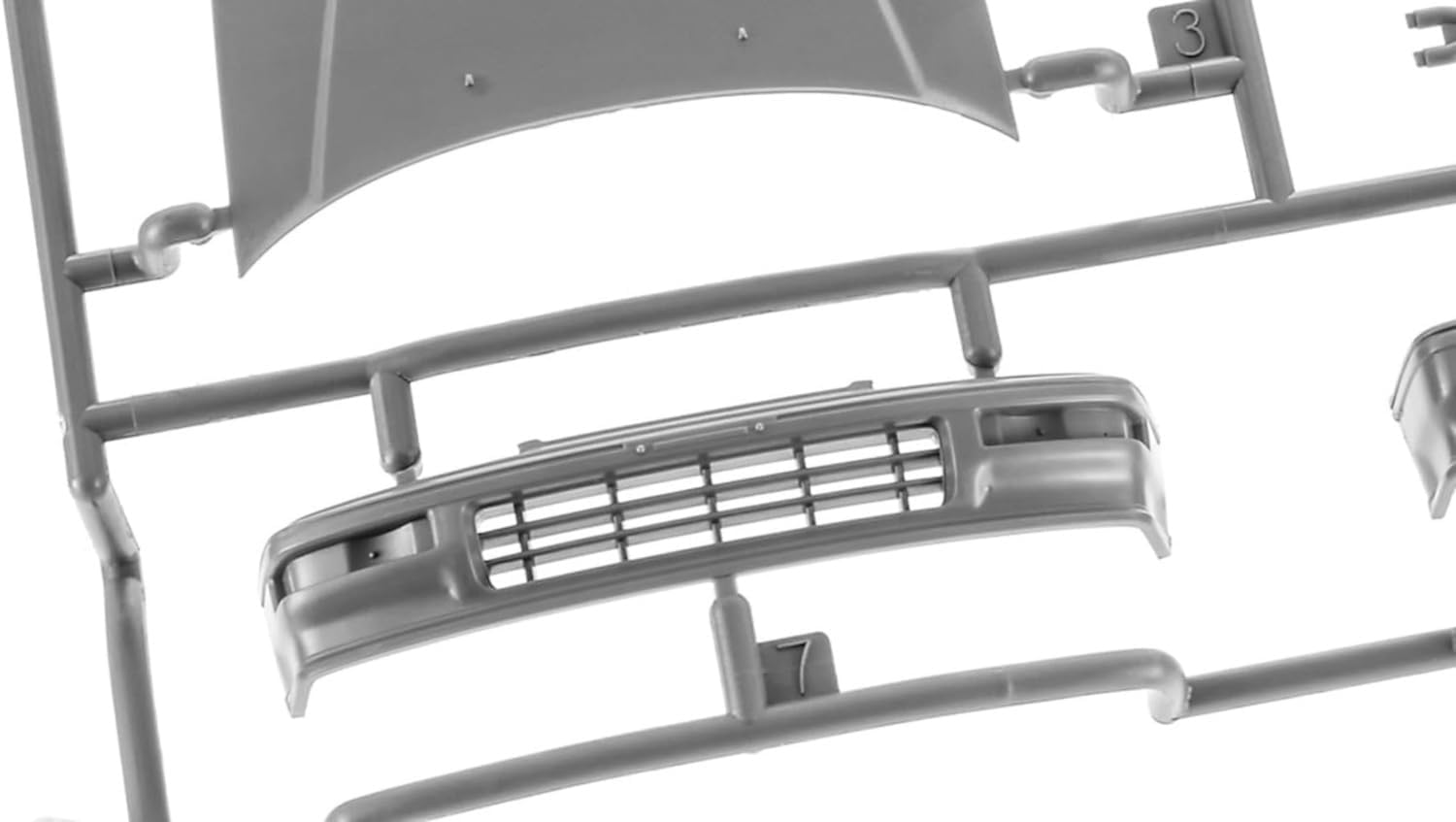 Plastic sprue with door panel parts