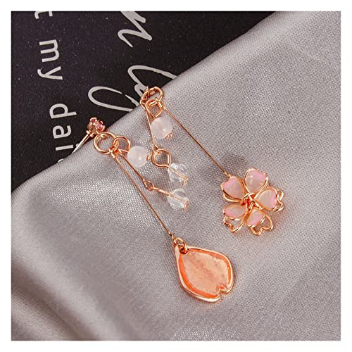 Boucles d'oreilles fleur rose clair au design long palissin suspendu unique
