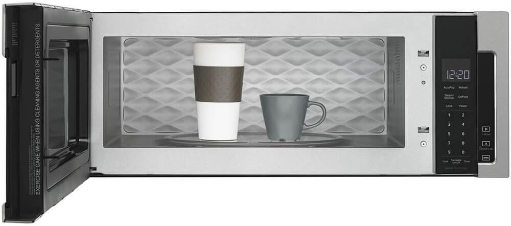 ינלענדיש view of the Whirlpool WML75011HZ microwave with two mugs on the turntable.