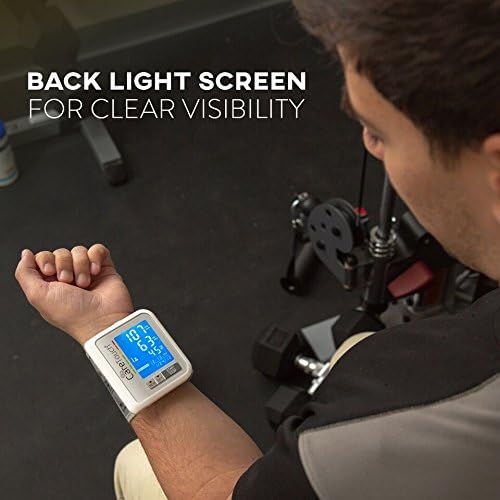 Man using Care Touch Wrist Blood Pressure Monitor with back-lit screen