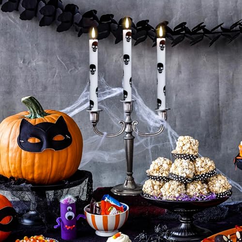Image of GenSwin Halloween Flameless Taper Candles Remote Timer, 4 Pack Real Wax LED Taper Candles Battery Operated Flickering with Skull Prints, Flameless Candlesticks for Halloween Decor(0.75 inchx 9.65 inch)