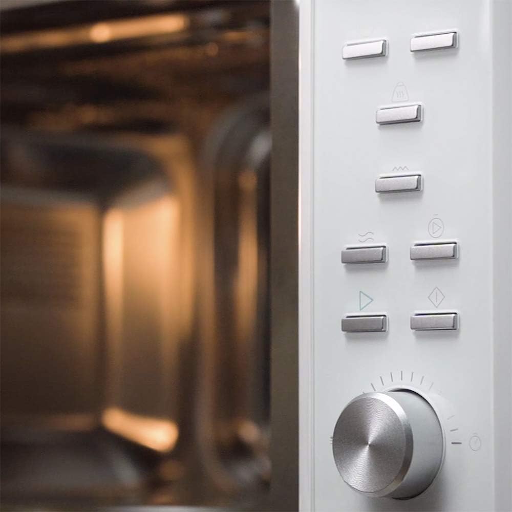 Close-up of the control panel and interior of the microwave