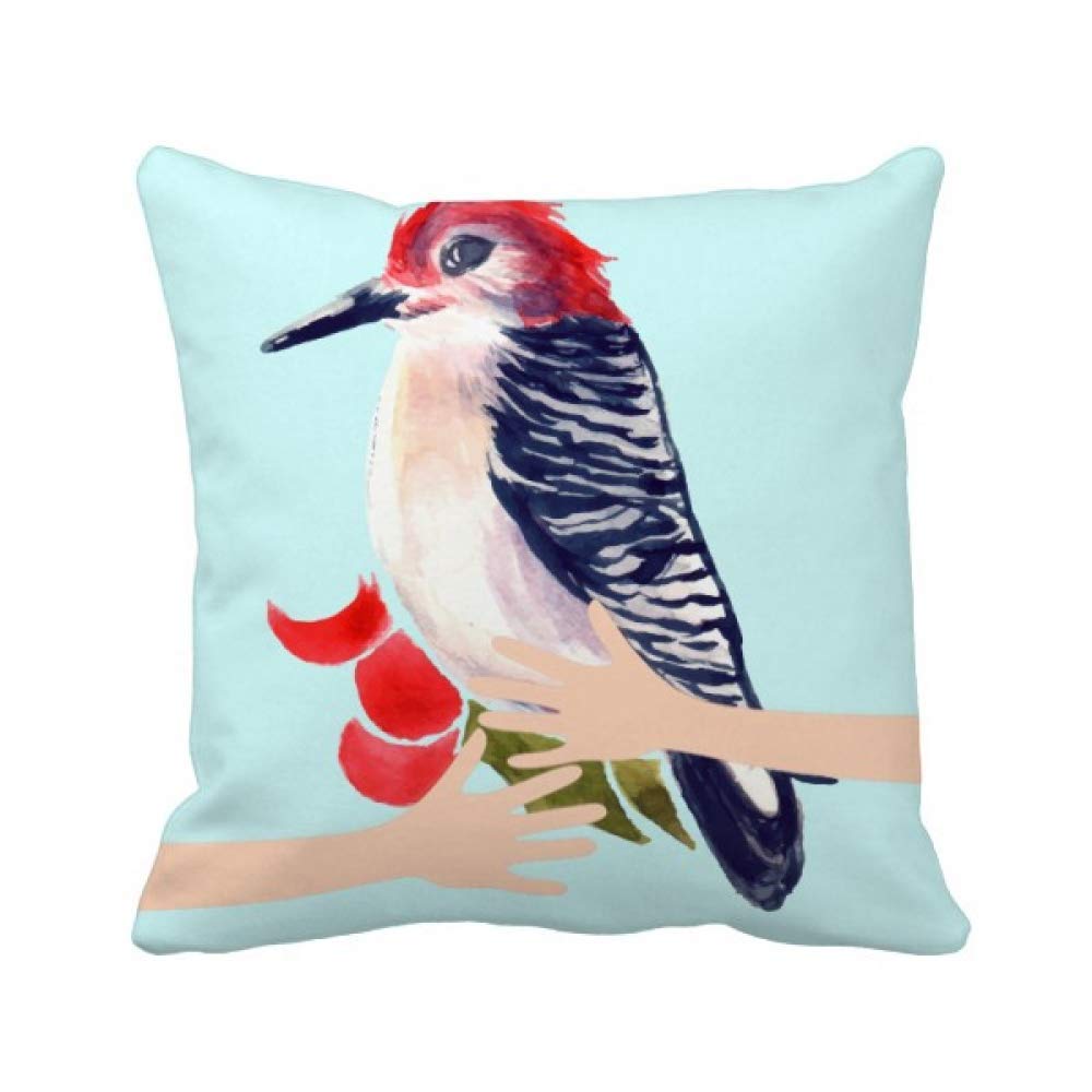 Coussin oiseau pie rousse câlin pour créer un coin lecture cocooning