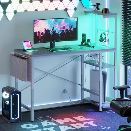 Image of Bestier Gaming Desk with Power Outlets, 44 Inch Led Gamer Desk with 4 Tiers Reversible Shelves, PC Gaming Table with Headset Hook & Side Storage Bag for Bedroom (Grey 3D Carbon Fiber)