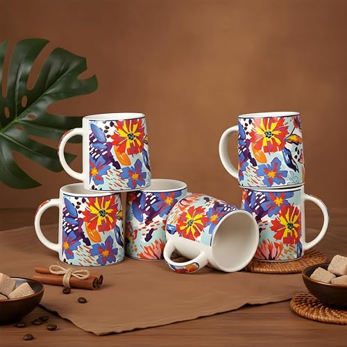 Image of Miah KaleidoBloom Ceramic Cup Set - Set of 6 | 10.16 cm x 6.85 cm x 8.89 cm | Handcrafted Coffee & Tea Mugs | Microwave & Dishwasher Safe | Vibrant Abstract Floral Design