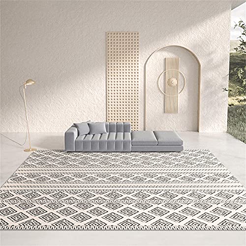 Design graphique géométrique et finitions soignées pour ce tapis - 2