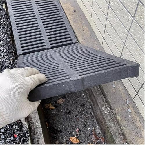 Grille de drainage extérieure pour garder une allée de garage propre et sèche