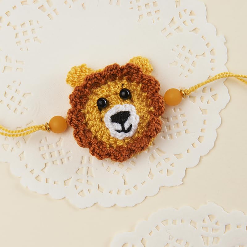Image of THE GIFT STUDIO.COM | Crochet Lion Rakhi for Kids | Handmade Animal Theme Rakhi for Kids | Raksha Bandhan Special
