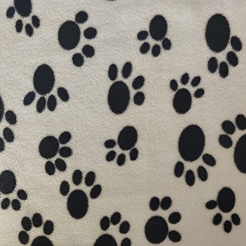 Tissu polaire imprimé pattes de chat pour créer un plaid de canapé cocooning