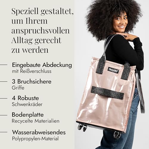 HULKEN - (Klein, Roségold) Wiederverwendbare Einkaufstasche auf Rädern. Der Einkaufswagen trägt bis zu 15 kg, hat robuste Griffe, einen Reißverschluss und ist flach, leicht und zusammenklappbar. – Bild 3