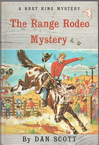 THE RANGE RODEO MYSTERY by DAN SCOTT Grosset Du... B08L6JL6ZC Book Cover