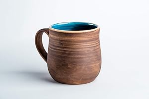 Enchanting Handmade Ceramic Coffee Mug: A Rustic Symphony for Your Daily Brew