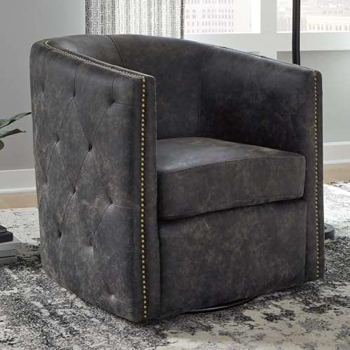 Image of Signature Design by Ashley Swivel Black Faux Leather Accent Chair | Elegant tufted faux leather with brass nailheads, Hidden metal swivel base for effortless conversation, Brentlow Series