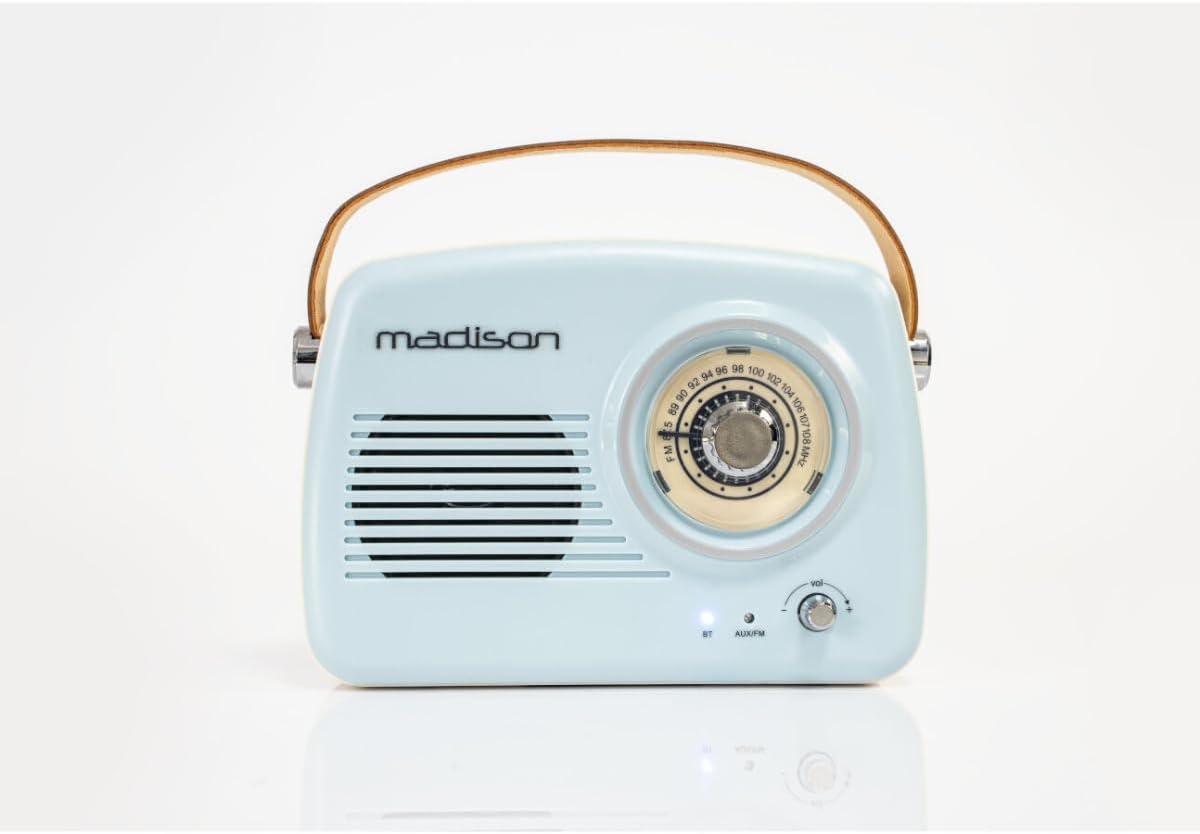 Назад view of the Madison FREESOUND-VR30 radio showing the telescopic antenna, subwoofer, USB charging port, and AUX input.