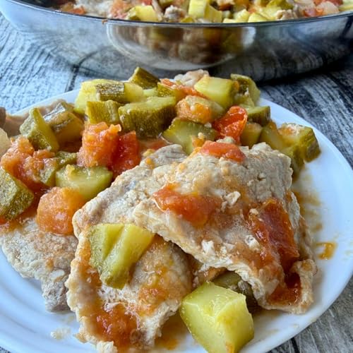 Fettine di arista in padella con zucchine e pomodori