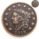 También aparece en el reverso en el bucle izquierdo de la cinta. La moneda del dólar de plata se suspendió después de 1904, cuando la demanda era baja y el suministro de lingotes se agotó. Según las disposiciones de la Ley Pittman de 1918, se derritieron 270.232.722 dólares de plata, y más tarde, en 1921, se reanudó la moneda del dólar de plata.