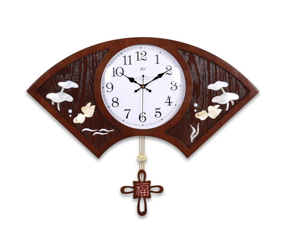 Horloge murale salon en bois silencieuse pour créer un espace zen
