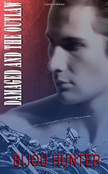 Paperback Damaged and the Outlaw Book