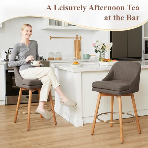 Image of kinmars Modern Bar Stools Set of 2,Swivel Counter Height Bar Stools with Soft Upholstered Back,Thick Seat,Wooden Legs, 27 inch Counter Stools for Kitchen Island (Brown, 2 Pieces - 27 inch Counter Height)