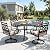 Sophia and William Swivel Patio Dining Set for 4, Outdoor Table and Chairs, Removable Seat Cushions, Black 42" Round Patio Dining Table