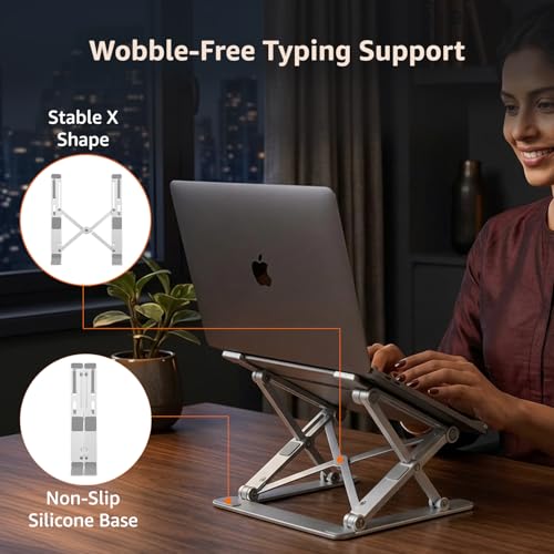 Image of amazon basics Laptop Stand, Height-Adjustable, Foldable, Portable, Ventilated, Fits Up to 15.6-Inch Laptops (Aluminium Alloy, Silver)