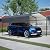 Metal Carport Kit 10x15 FT Heavy Duty Galvanized Garage Shed for Car Truck Boat Outdoor All Weather Sunshade Canopy Tent Car Shelter with Tarpaulin Sidewalls Enhanced Base Sloped Top