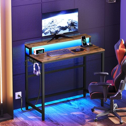 Image of YATINEY Small Computer Desk with Charging Station and LED Lights, Gaming Desk with Monitor Stand, 2-Tier Home Office Desk with 4 Side Hooks, for Living Room, Home Office, Rustic Brown DN01UDBRY2
