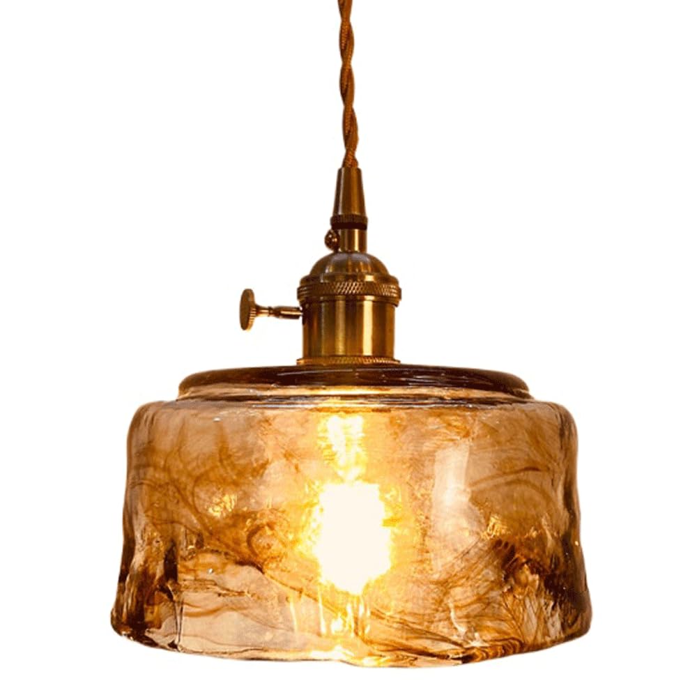 Lustre à tête unique pour éclairer une table de salon sombre