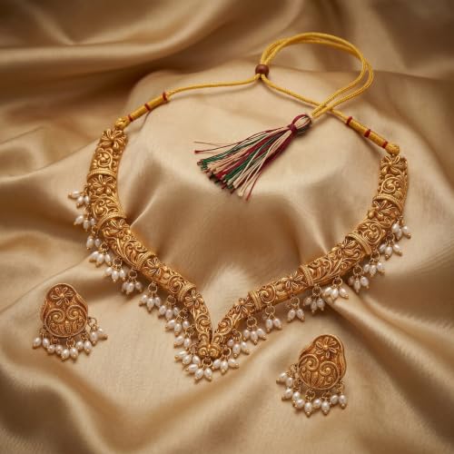 Image of Gold-Plated Antique Temple Jewellery Set for Women - Traditional Necklace with Large Peacock Pendant & Matching Jhumka Earrings | Ethnic Festive & Bridal Wear Set with Ruby & Emerald Accents